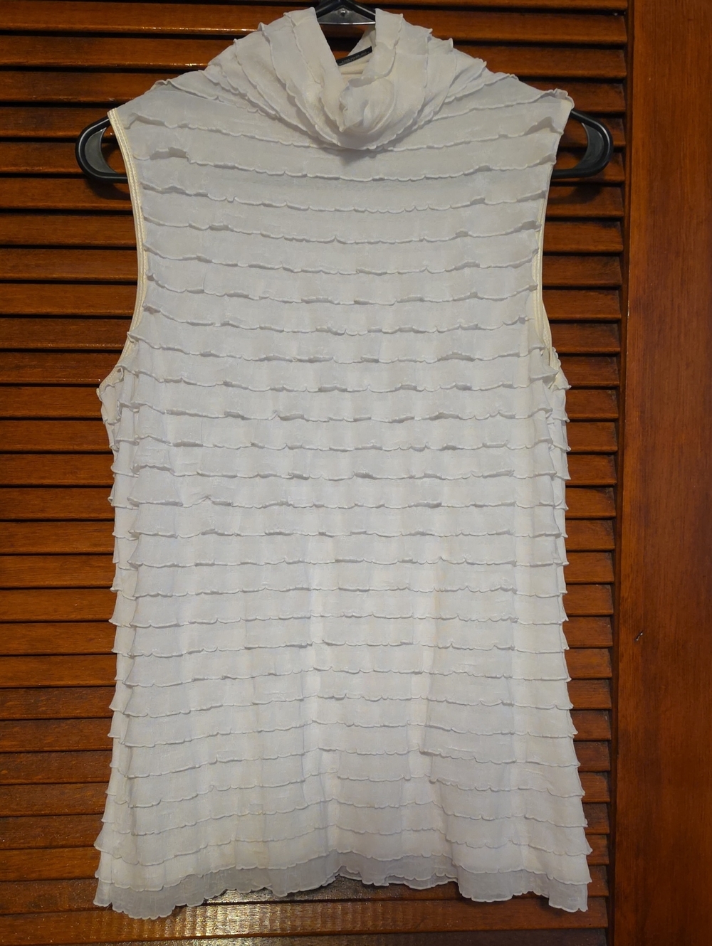 Sleeveless White Ruffle Tiered Mock Neck Top